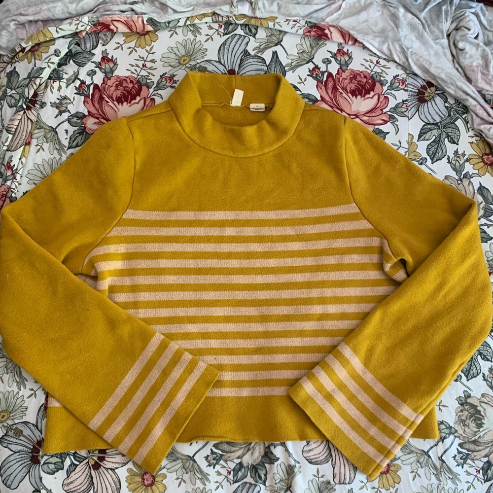 Mustard, mock neck, bell sleeve cropped sweater.